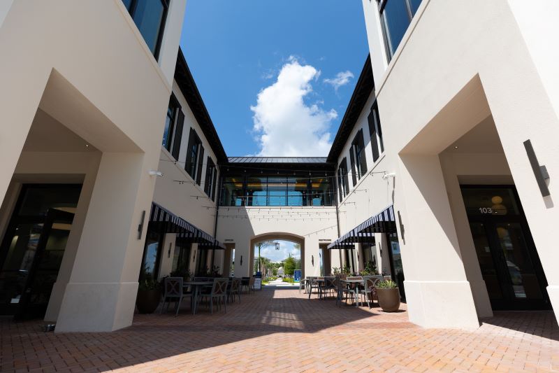 A lovely day shot of the breezeway in the building where patients go to Improve Circulation in North Port 